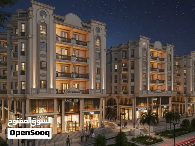 شقق سكنيه بمقدم 230 الف جمب الاكوا بارك ومجمع البنوك اسوان الجديده