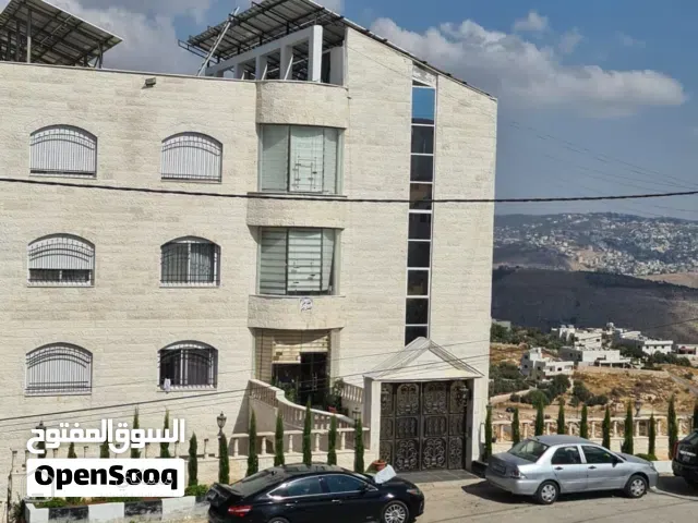عمارة سكنية شارع الستين وليست اسكانات خمس طوابق وتسوية شقق طابقية كل شقة طابق مساحة كل شقة 266 متر